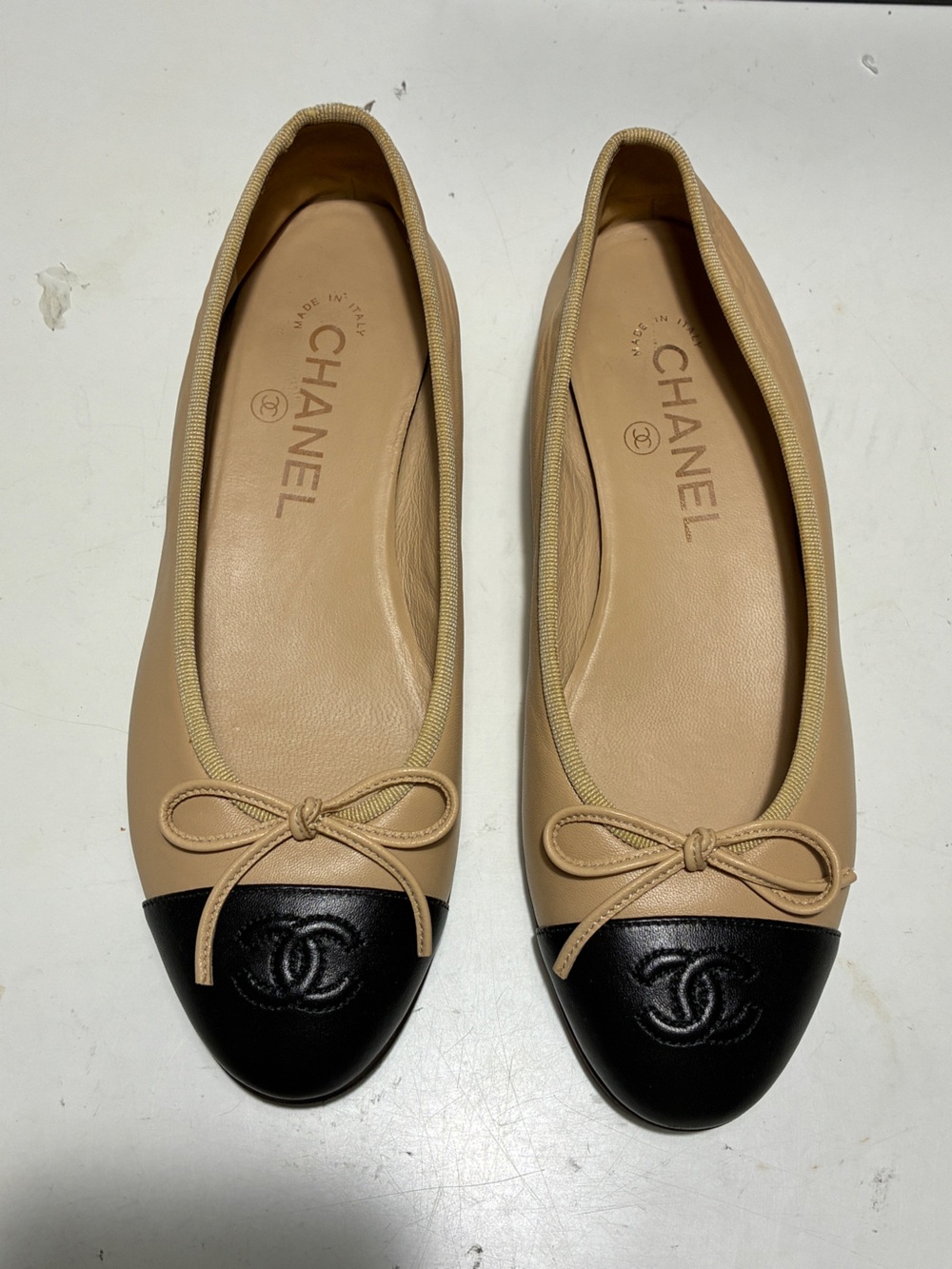CHANEL Two-Tone Beige and Black Cap-Toe Ballet Flats